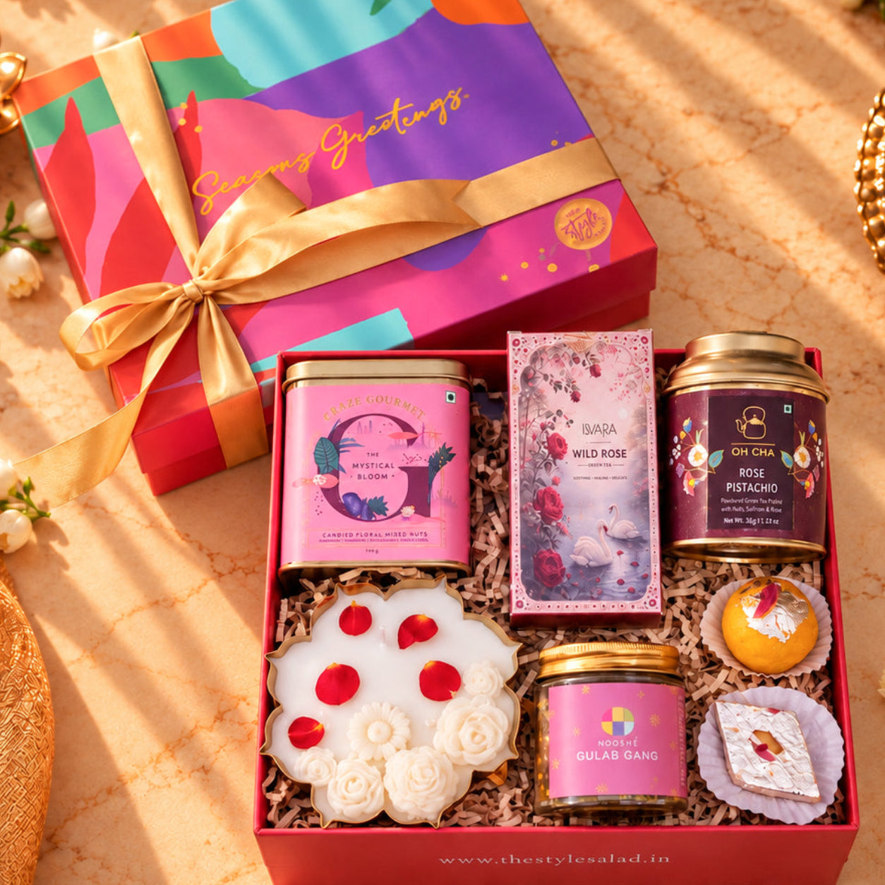 Gulaab rose themed Diwali gift hamper with Gulab Gang mukhwas, plantable mithai, floral mixed nuts, rose pistachio tea, urli candle and incense