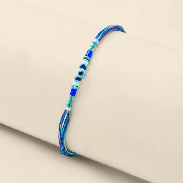 Boho Evil Eye Rakhi featuring colorful beads and symbolic charm for Raksha Bandhan celebrations.
