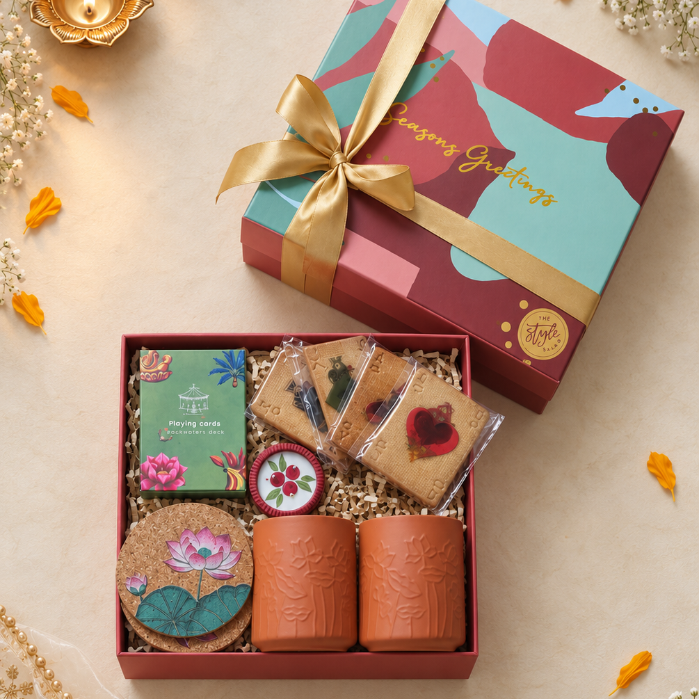 Kamal Deep I Diwali gift hamper with Kamalam glass set, lotus cork coasters, playing cards, terracotta diya and almond strawberry biscuits